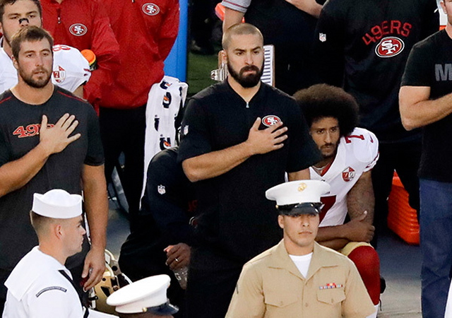 https://pmchollywoodlife.files.wordpress.com/2016/08/colin-kaepernick-jeremy-lane-sitting-national-anthem-3.jpg?w=600