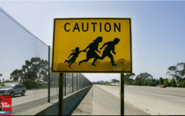 LI-105-Immigrant-Crossing-Sign-620x390.png