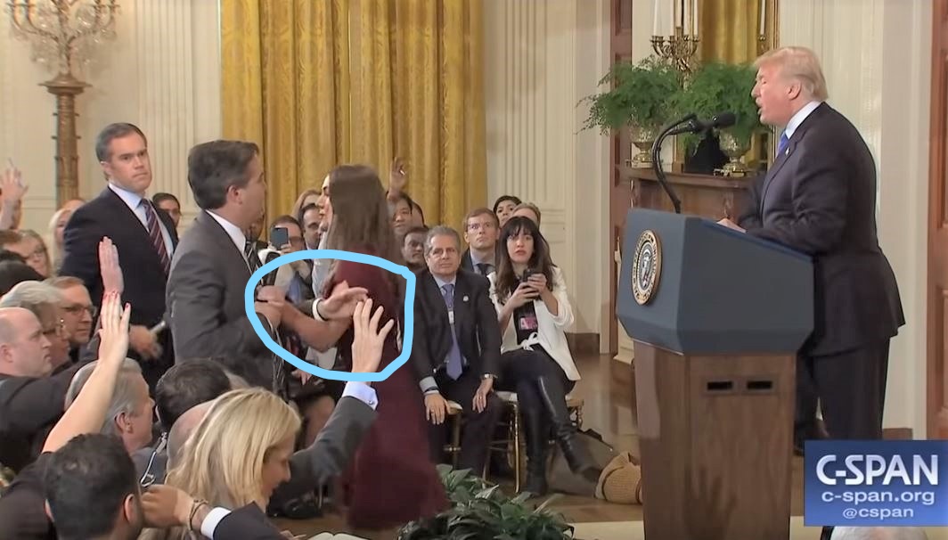 Jim-Acosta-White-House-Female-Staffer-Microphone-2-highlighted.jpg